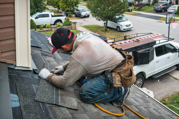 Professional Flat Roof Repair technician working in Ionia, MI